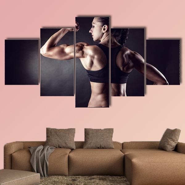 Athletic Young Woman Showing Muscles Leinwandbilder Sport