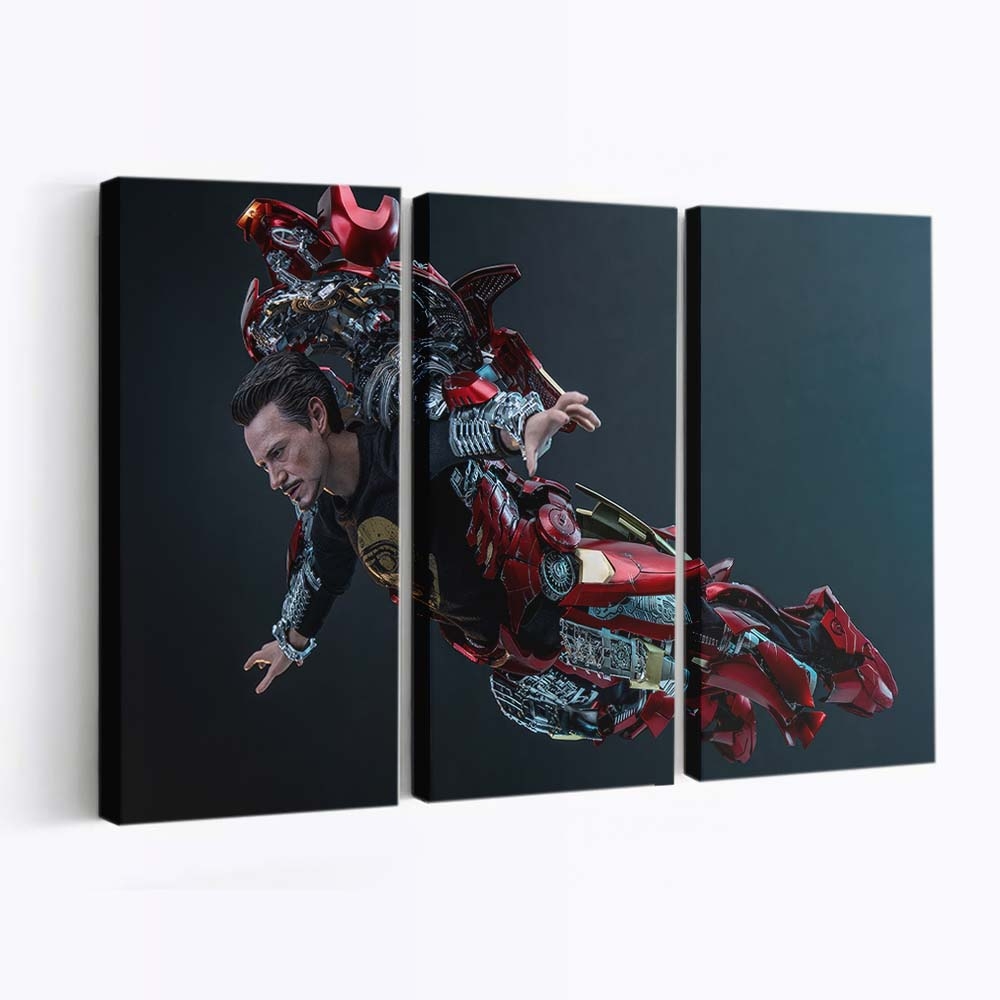 Tony Stark zieht sich als Iron Man an Leinwandbild - Wanddeko